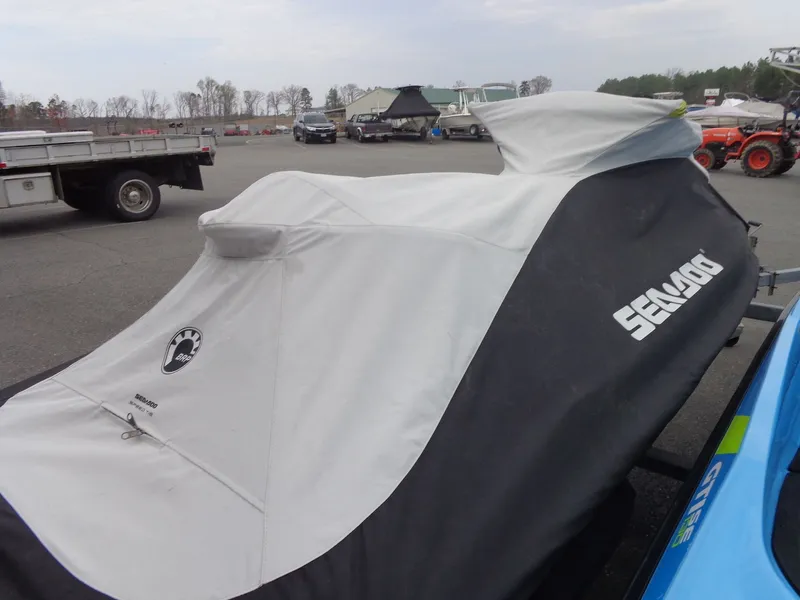 Slide: The Image of Covered 2015 Sea-Doo GTR™ 215 jet ski in parking lot. - 30