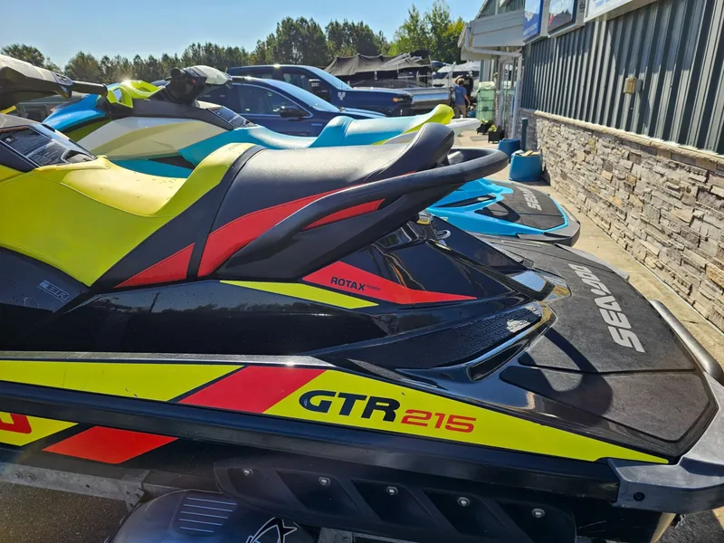 Slide: The Image of 2015 Sea-Doo GTR 215 jet ski in vibrant colors. - 4