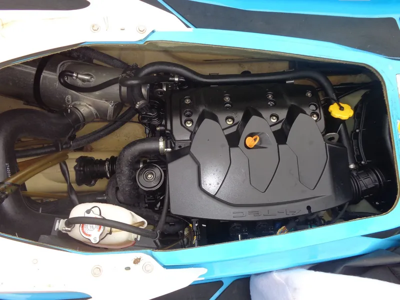 Slide: The Image of Engine compartment of a 2015 Sea-Doo GTI SE 130 jet ski. - 12