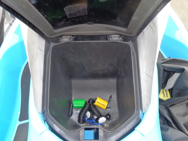 Slide: The Image of Storage compartment of 2015 Sea-Doo GTI SE 130 with accessories. - 14