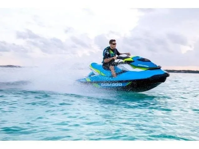 Slide: The Image of 2015 Sea-Doo GTI SE 130 jet ski on water in action. - 28