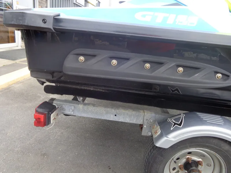 Slide: The Image of Rear view of a 2015 Sea-Doo GTI SE 130 on trailer. - 7
