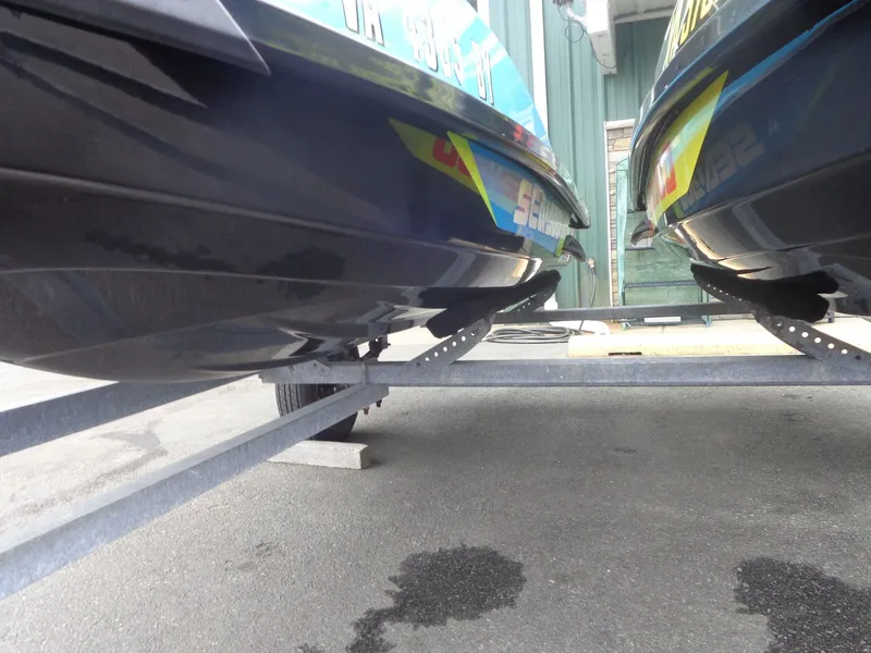 Slide: The Image of Underside of two Sea-Doo GTI SE 130 jet skis on a trailer. - 9