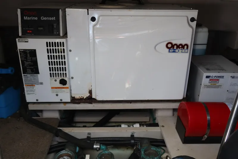 Slide: The Image of Onan marine generator in a 2005 Sea Ray 500 Sundancer yacht engine room. - 11