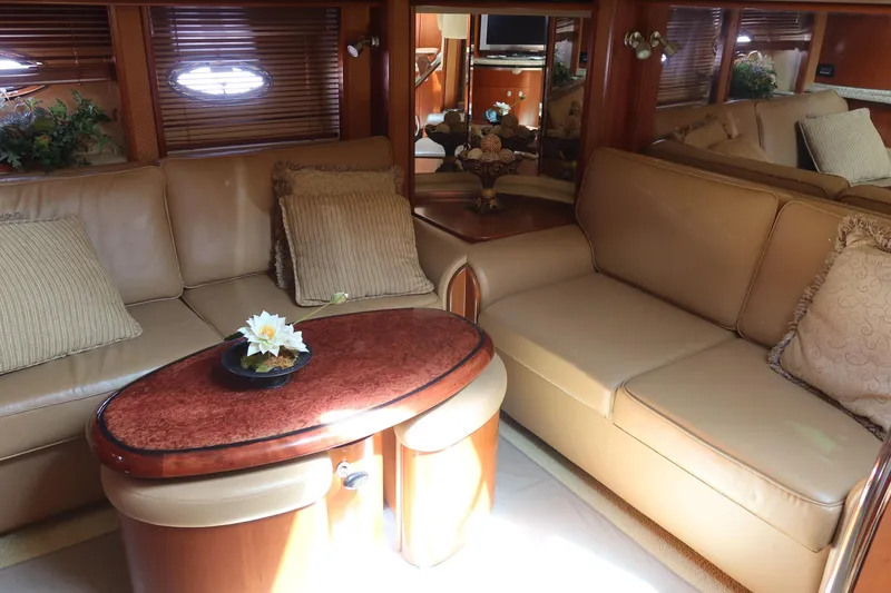 Slide: The Image of Luxurious interior of 2005 Sea Ray 500 Sundancer yacht with elegant seating and decor. - 14
