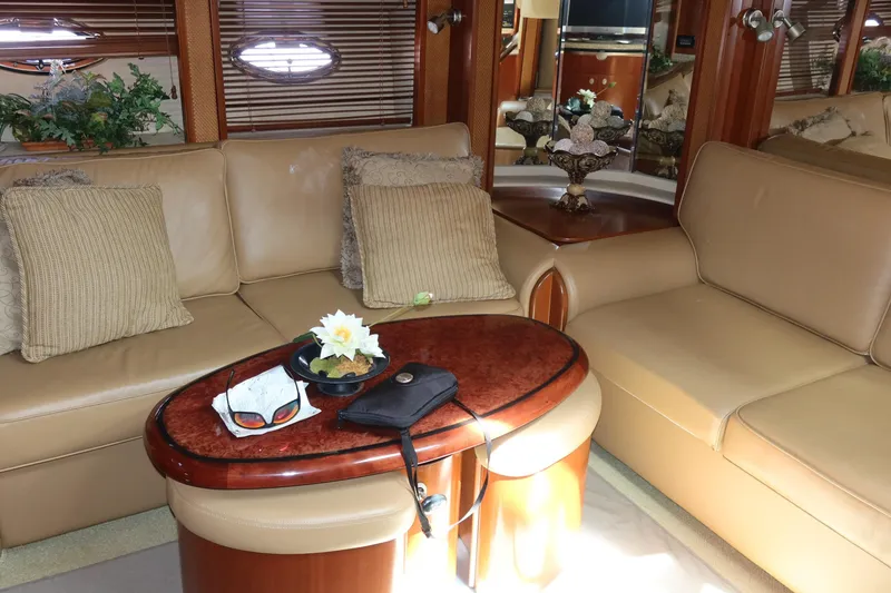 Slide: The Image of Luxurious interior of 2005 Sea Ray 500 Sundancer yacht with leather seating and elegant decor. - 19