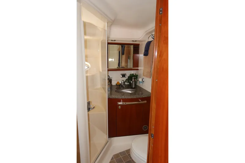 Slide: The Image of Luxurious bathroom in 2005 Sea Ray 500 Sundancer yacht with shower and vanity. - 21