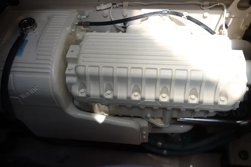 Slide: The Image of Engine compartment of a 2005 Sea Ray 500 Sundancer boat. - 9