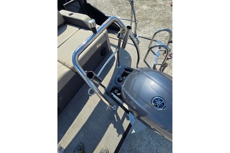 Slide: The Image of 2022 Barletta C22UC boat with Yamaha engine and seating area, viewed from above. - 11