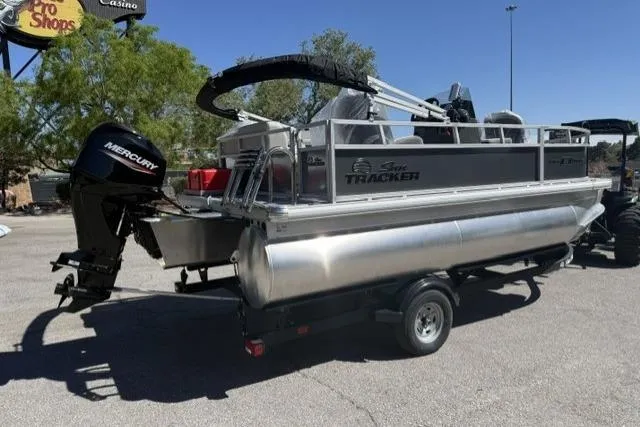 Slide: The Image of 2026 Sun Tracker Bass Buggy 16 XL Select pontoon boat with Mercury outboard motor. - 3