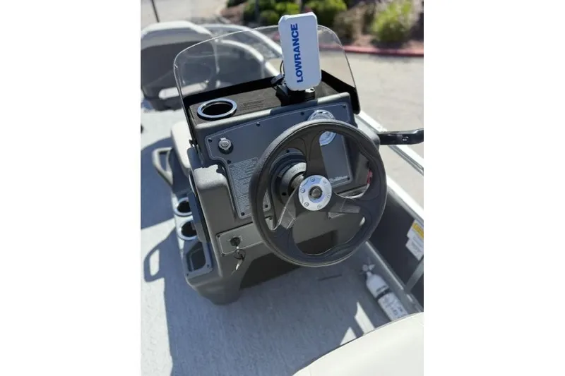 Slide: The Image of 2026 Sun Tracker Bass Buggy 16 XL Select steering console with Lowrance device. - 4