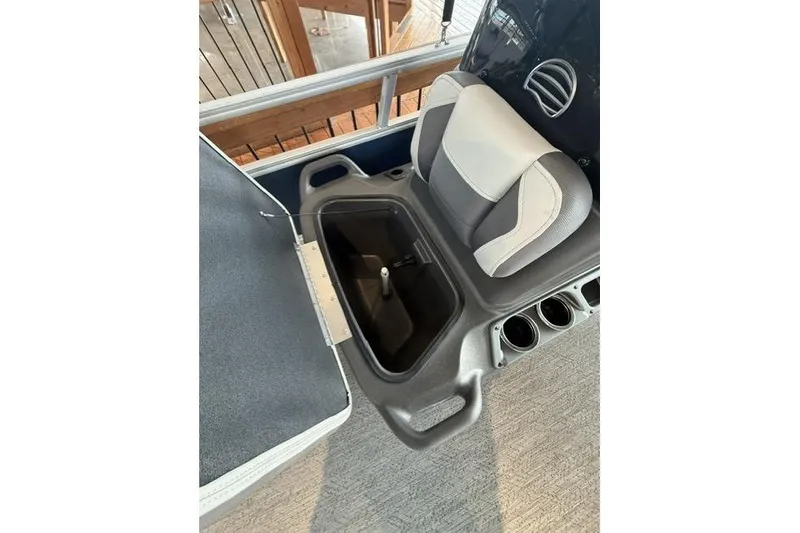 Slide: The Image of 2026 Sun Tracker Bass Buggy 16 XL Select interior with storage compartment and seating. - 6
