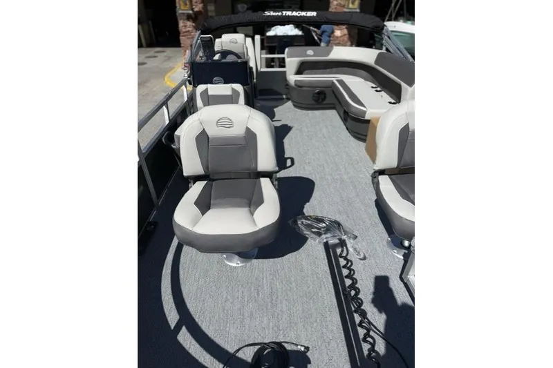 Slide: The Image of 2026 Sun Tracker Bass Buggy 16 XL Select interior with comfortable seating and modern design. - 9