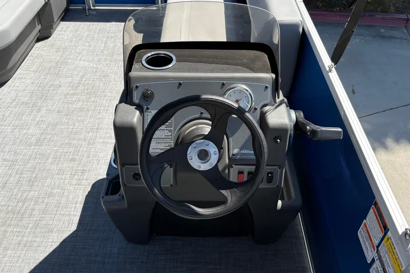 Slide: The Image of Steering console of 2026 Sun Tracker Party Barge 16 DLX pontoon boat. - 29
