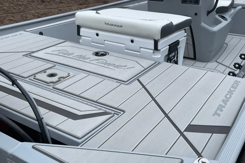 Slide: The Image of 2026 Tracker Bass Tracker Classic CC boat interior with sleek deck design and seating. - 8