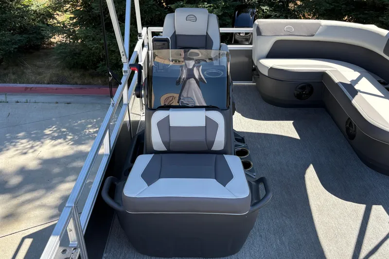 Slide: The Image of 2026 Sun Tracker Bass Buggy 16 XL Select interior with modern seating and console design. - 11