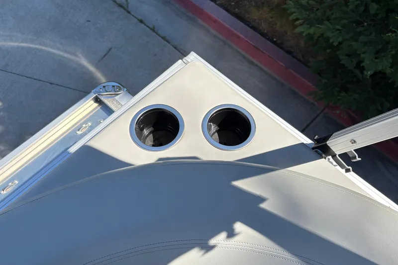 Slide: The Image of 2026 Sun Tracker Bass Buggy 16 XL Select boat with dual cup holders. - 23