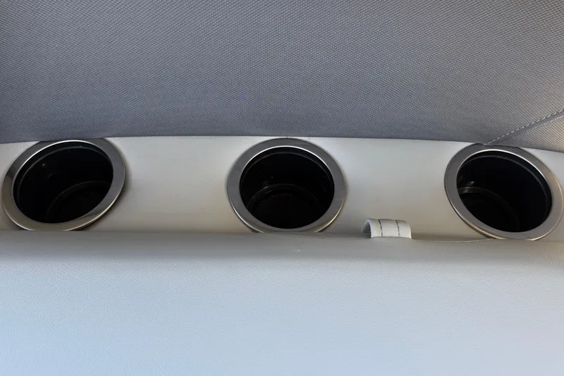 Slide: The Image of Cup holders in 2026 Sun Tracker Bass Buggy 16 XL Select boat interior. - 19