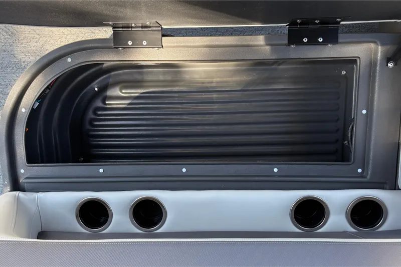 Slide: The Image of Storage compartment of 2026 Sun Tracker Bass Buggy 16 XL Select boat. - 16