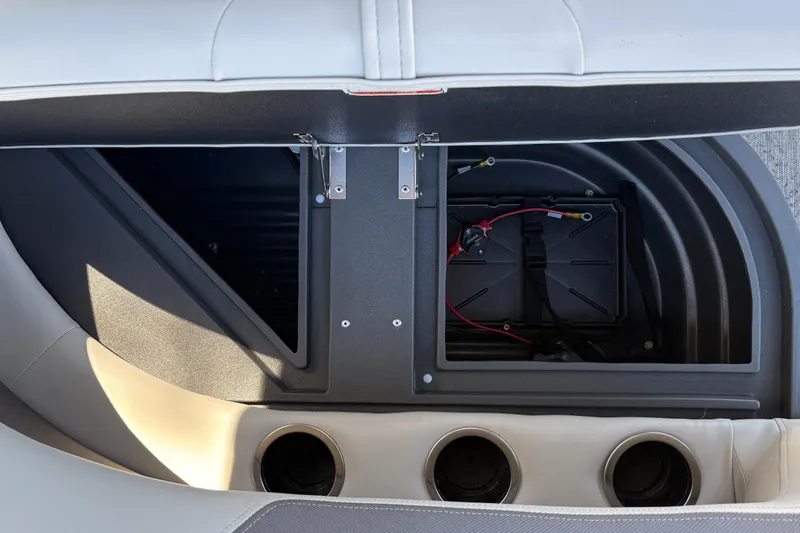 Slide: The Image of Open storage compartment in 2026 Sun Tracker Bass Buggy 16 XL Select boat. - 18