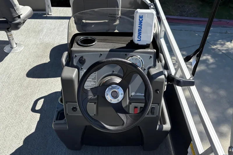 Slide: The Image of 2026 Sun Tracker Bass Buggy 16 XL Select steering console with Lowrance device. - 13