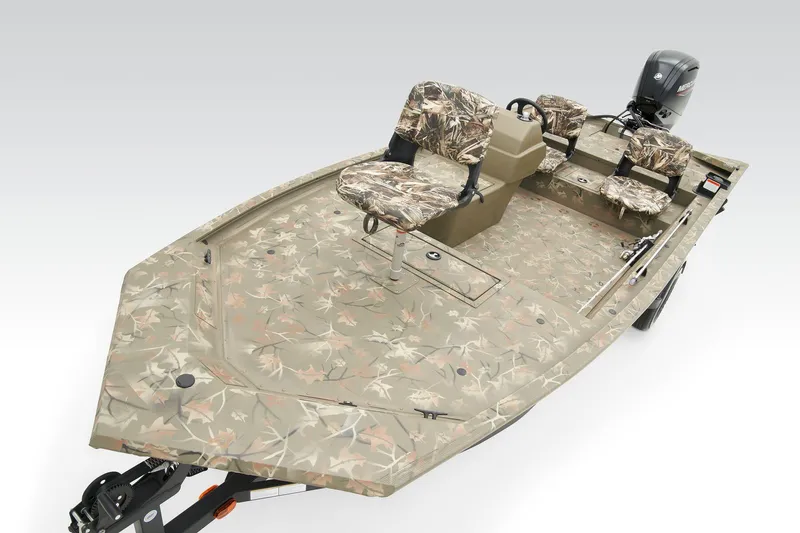 Slide: The Image of 2026 Tracker Grizzly 1754 SC boat interior with open storage compartment. - 6