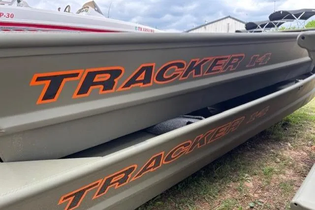 The Image of 2026 Tracker Grizzly 14 Jon boat with bold orange branding. - 0