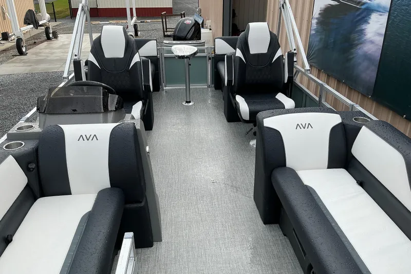 Slide: The Image of 2026 Avalon Venture Quad Lounge boat interior with sleek seating and modern design. - 4