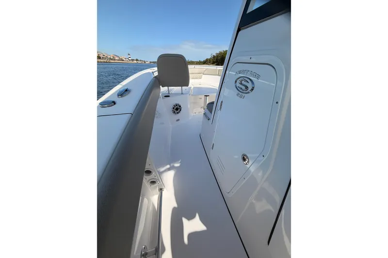 Slide: The Image of 2025 Sportsman Open 262 Center Console boat interior with speakers and control panel. - 11