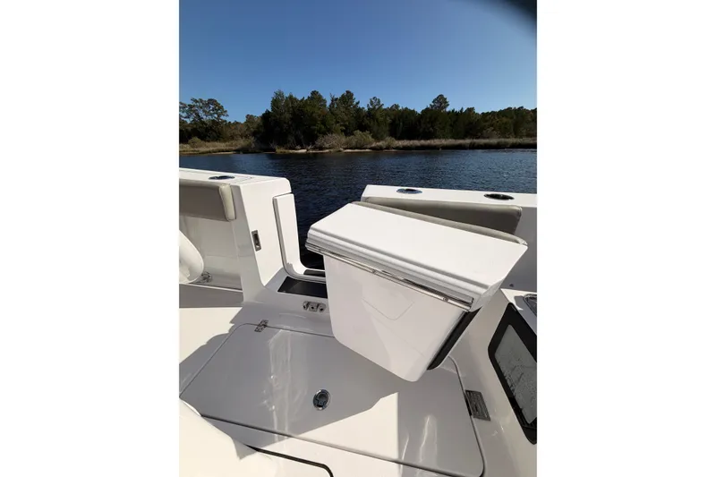 Slide: The Image of 2025 Sportsman Open 262 Center Console boat interior with open storage compartment. - 20