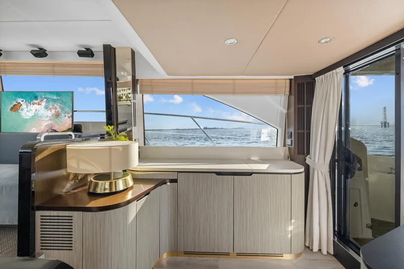 Slide: The Image of Luxurious interior of 2019 Azimut 55 yacht with ocean view and modern decor. - 24