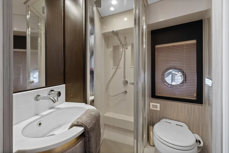 Slide: The Image of Luxurious bathroom in 2019 Azimut 55 yacht with modern fixtures and elegant design. - 31
