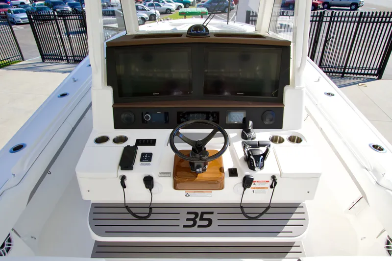 Slide: The Image of 2027 Regulator 35: Helm with modern instruments and steering wheel. - 21