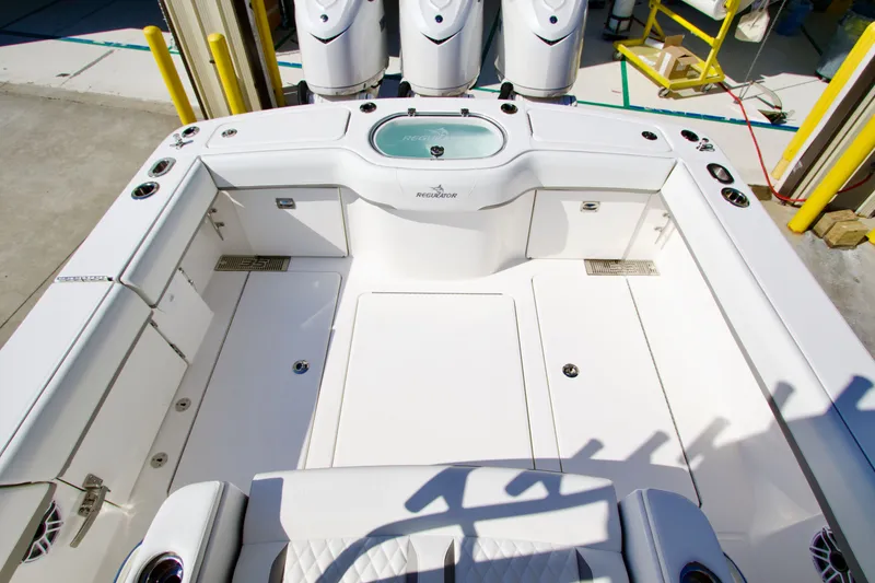 Slide: The Image of 2027 Regulator 35 with spacious white cockpit and modern amenities. - 30
