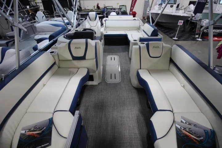 Slide: The Image of 2026 Avalon Catalina Versatile Rear Lounge boat interior with plush seating and modern design. - 11
