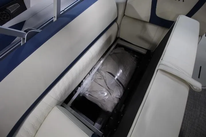Slide: The Image of 2026 Avalon Catalina Versatile Rear Lounge boat seat storage compartment. - 12