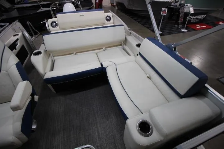 Slide: The Image of 2026 Avalon Catalina Versatile Rear Lounge boat interior with plush seating and cup holders. - 13