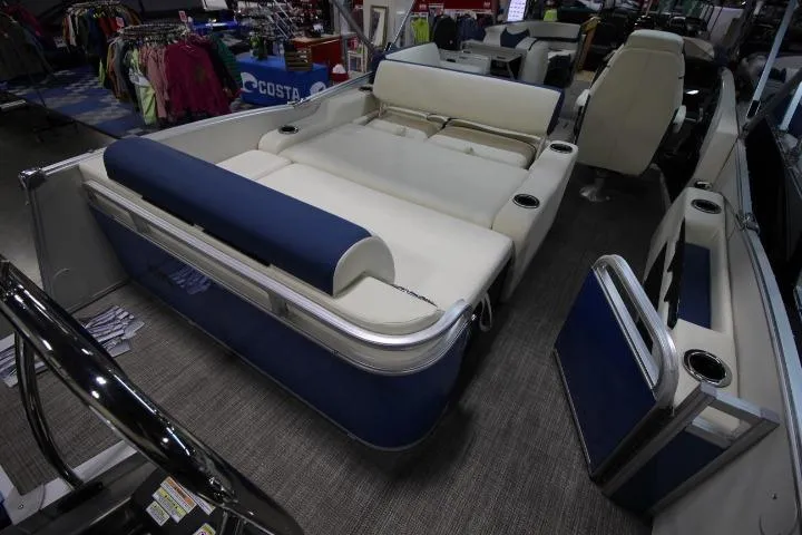 Slide: The Image of 2026 Avalon Catalina Versatile Rear Lounge boat interior with plush seating and modern design. - 6