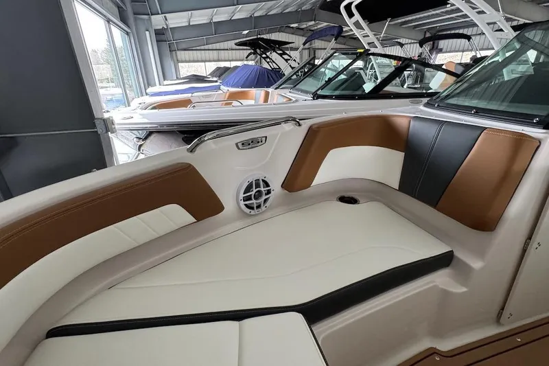 Slide: The Image of Interior view of 2025 Chaparral 21 SSi OB boat with stylish seating and speaker. - 17