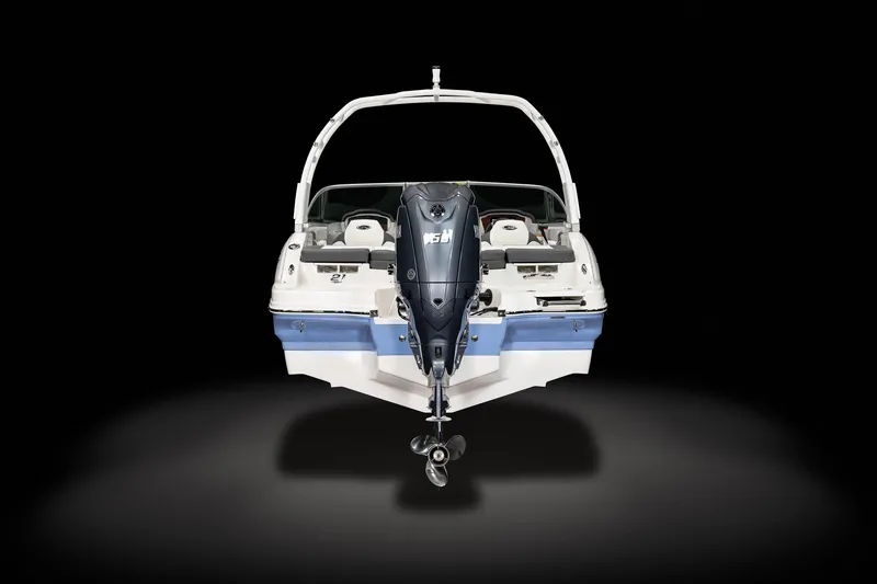 Slide: The Image of 2025 Chaparral 21 SSi OB boat, rear view with outboard motor, on black background. - 6