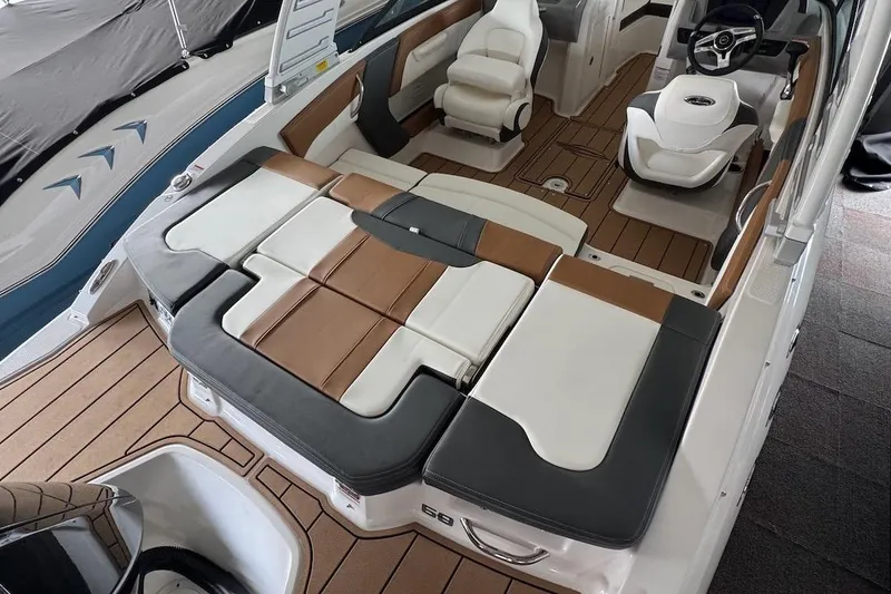 Slide: The Image of 2025 Chaparral 21 SSi OB boat interior with stylish seating and modern design. - 7