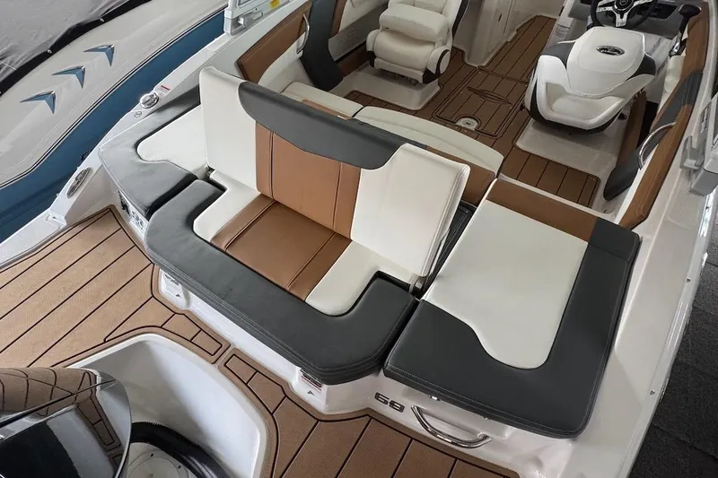 Slide: The Image of 2025 Chaparral 21 SSi OB boat interior with stylish seating and modern design. - 8