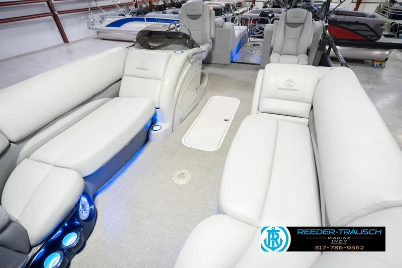 Slide: The Image of Luxurious interior of a 2017 Bennington 220 LE3 pontoon boat with plush seating. - 12
