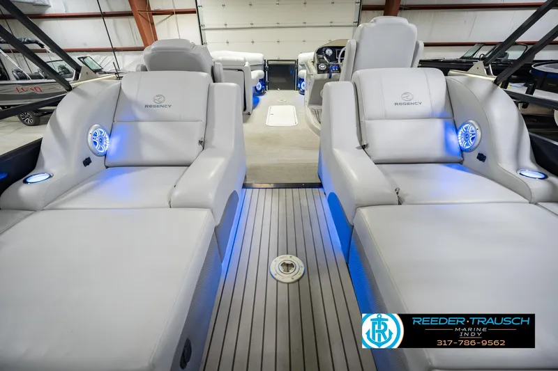 Slide: The Image of Luxurious interior of 2017 Bennington 220 LE3 boat with plush seating and ambient lighting. - 19