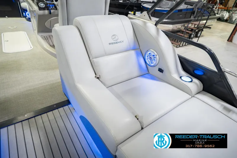 Slide: The Image of Luxurious seating on a 2017 Bennington 220 LE3 pontoon boat with blue LED lighting. - 27