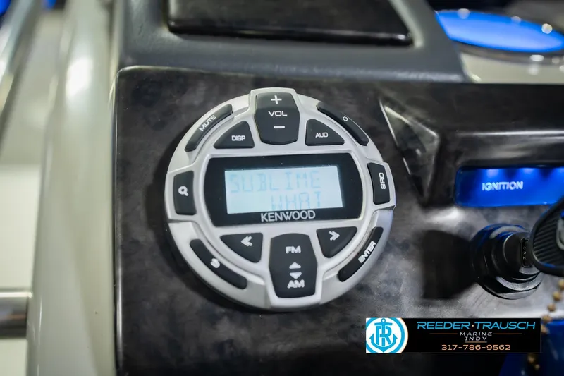 Slide: The Image of Kenwood audio system on 2017 Bennington 220 LE3 boat dashboard. - 32
