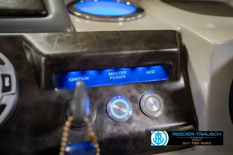 Slide: The Image of Control panel of a 2017 Bennington 220 LE3 boat with ignition and power buttons. - 33