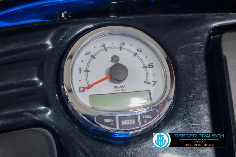 Slide: The Image of Close-up of a 2017 Bennington 220 LE3 tachometer displaying RPM gauge. - 34