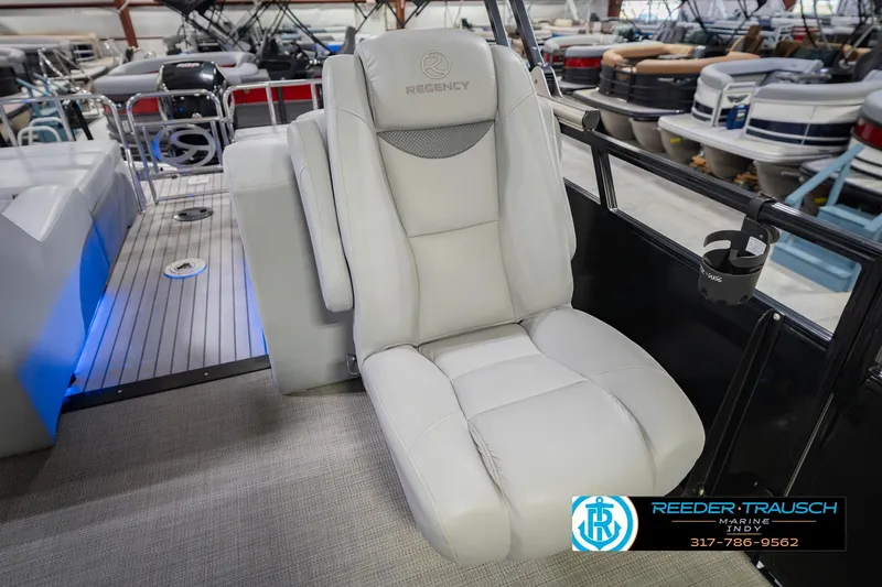 Slide: The Image of Luxurious seating on a 2017 Bennington 220 LE3 pontoon boat, featuring plush upholstery. - 42