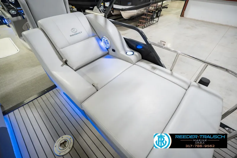 Slide: The Image of Luxurious seating on 2017 Bennington 220 LE3 pontoon boat with blue LED lighting. - 43